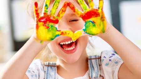 colourful play paint hands happy girl